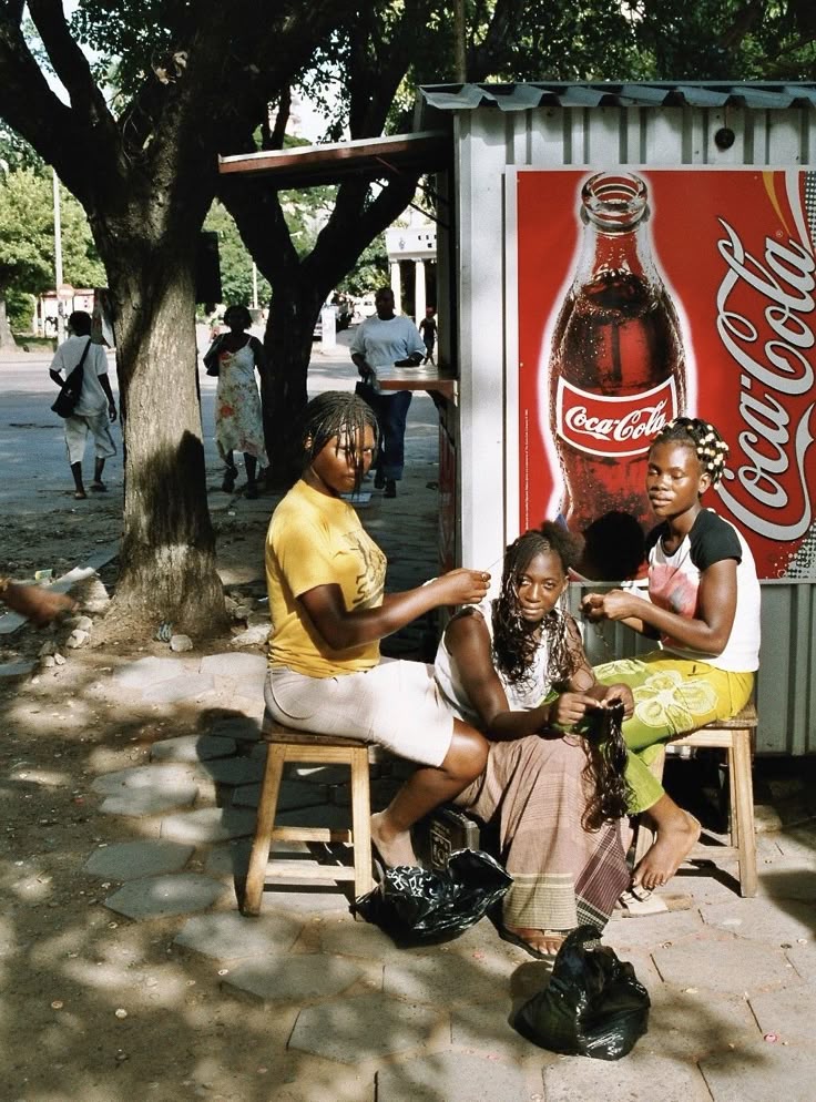 Community entrepreneurs collaborating under a tree